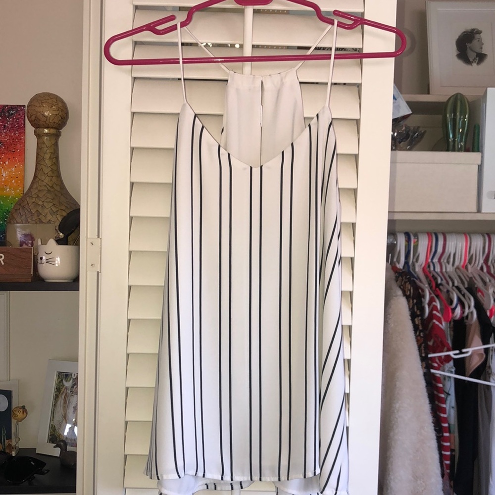 Express black and white striped reversible blouse cami. V neck.